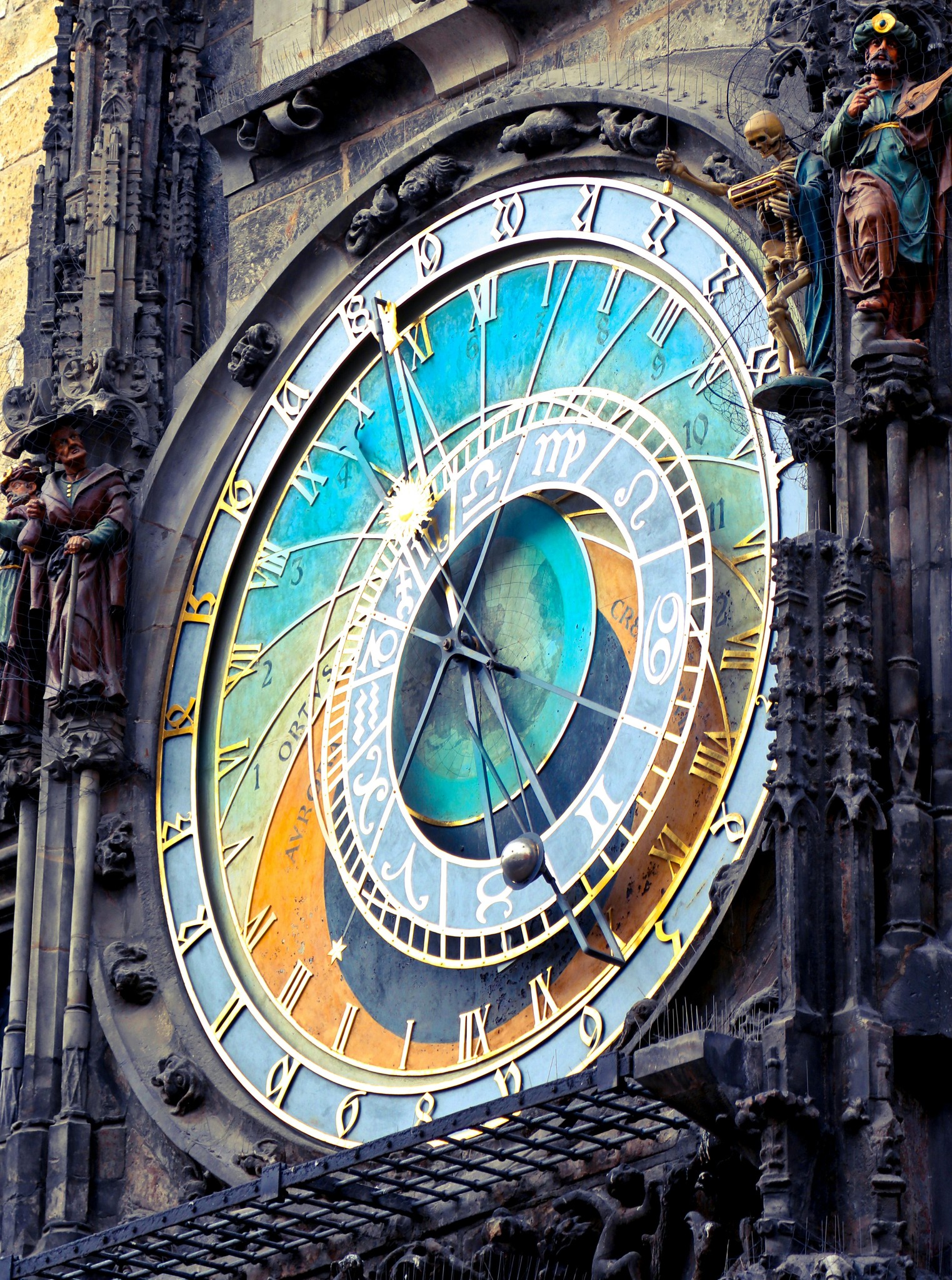 A gothic church clock with skeleton figures, holy men from different religions, and numerals in Roman, astrological, and another language, symbolizing the passage of time and the urgency of making a decision for addiction recovery